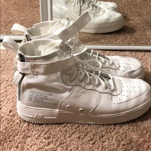 black and blue nike tns